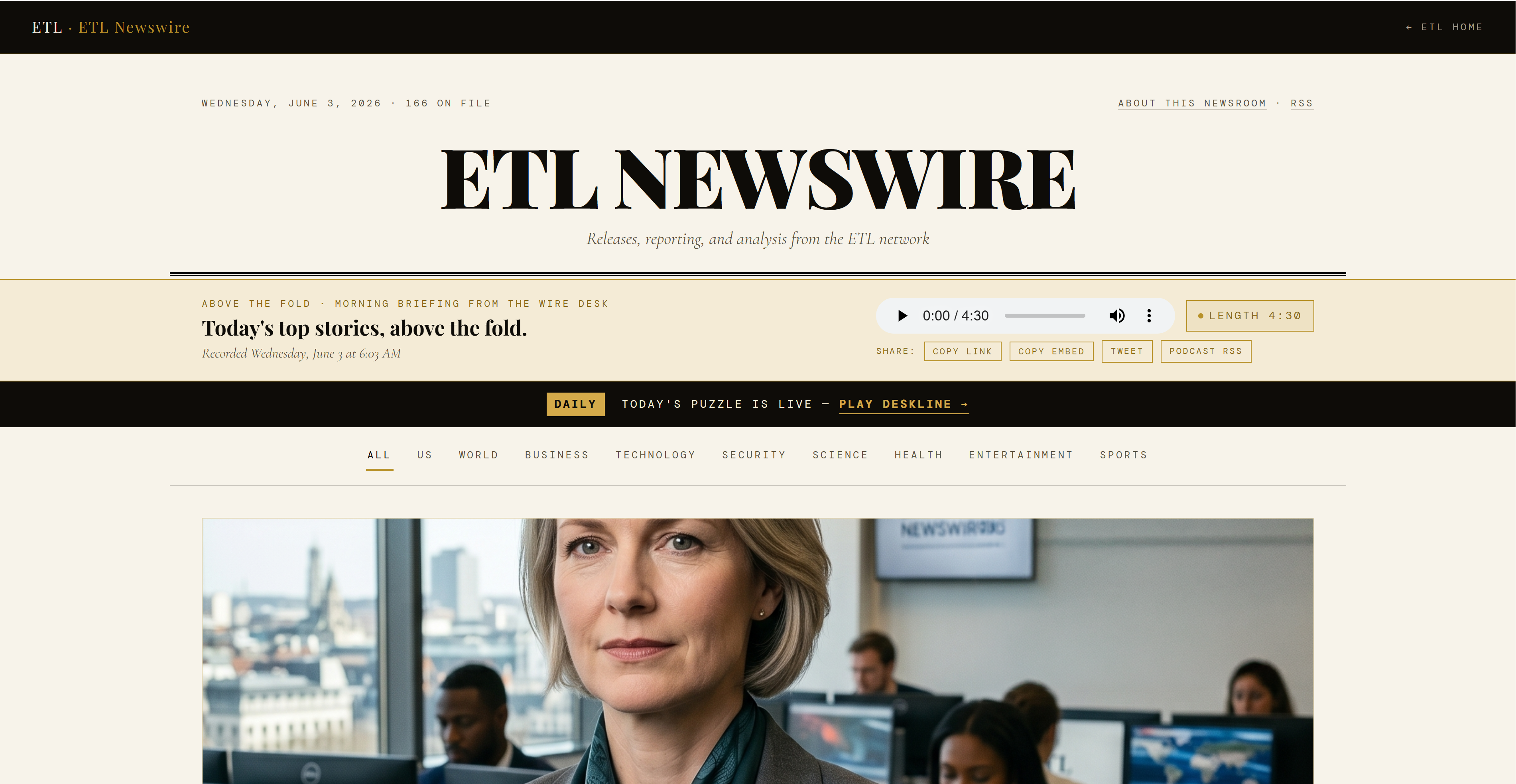 ETL Newswire anchor at her desk
