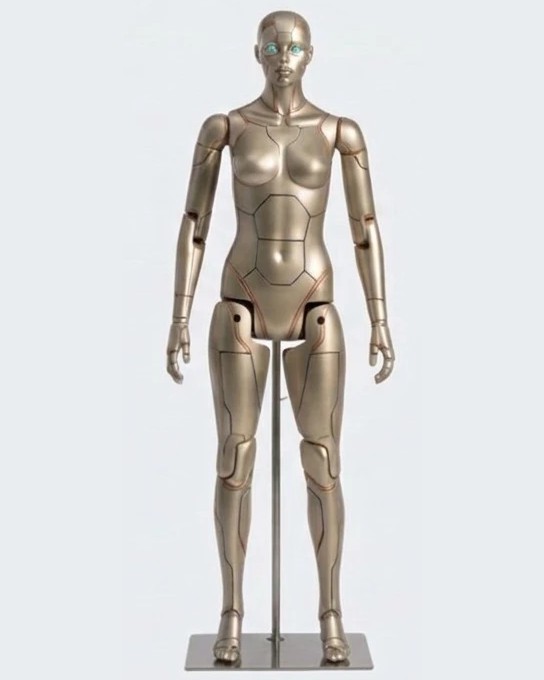 Astra-9, the full size figure being built, standing on her floor stand.